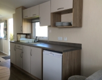 [Holiday hire caravan kitchen, Norfolk]