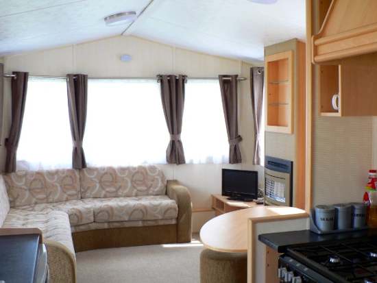 Photo of a living room in one of our holiday caravans
